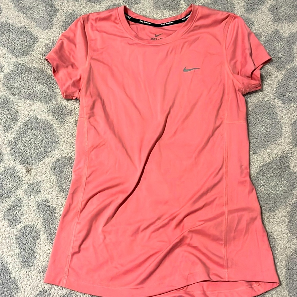 Women’s pink Nike shirt